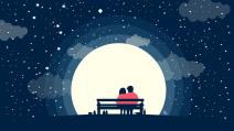 Par sedi na klupi uz pun Mesec